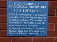 The plaque next to the Maynard Blueboy statue