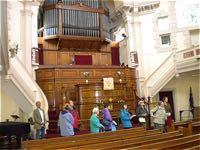 There is now an organ above the pulpit
