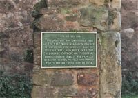 The plaque on the rescued wall.