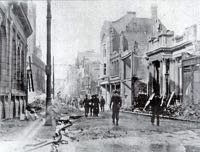 236 High Street (to the right of the central figure) was badly damaged in the May 1942 blitz