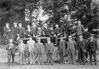 Mill workers photographed, ready to go on an outing