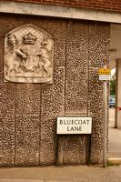 The 'coat of arms' and the street name sign