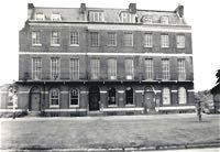 Photo of the three surviving houses taken in 1966