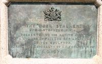 The plaque on the plinth