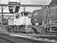 A Hunslet shunter moving oil wagons