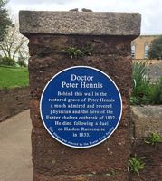 The plaque to Dr Hennis