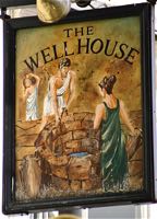 The old sign for the Well House Tavern