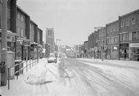 The winter of 1963, and snow covers South Street